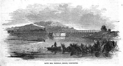 Savin Hill Railroad Bridge circa 1855: An engraving from Ballou's Pictorial Drawing-Room Companion shows a steam engine on a wooden trestle pulling a train across the waters of Dorchester Bay. The MBTA Red Line uses the same route today.
